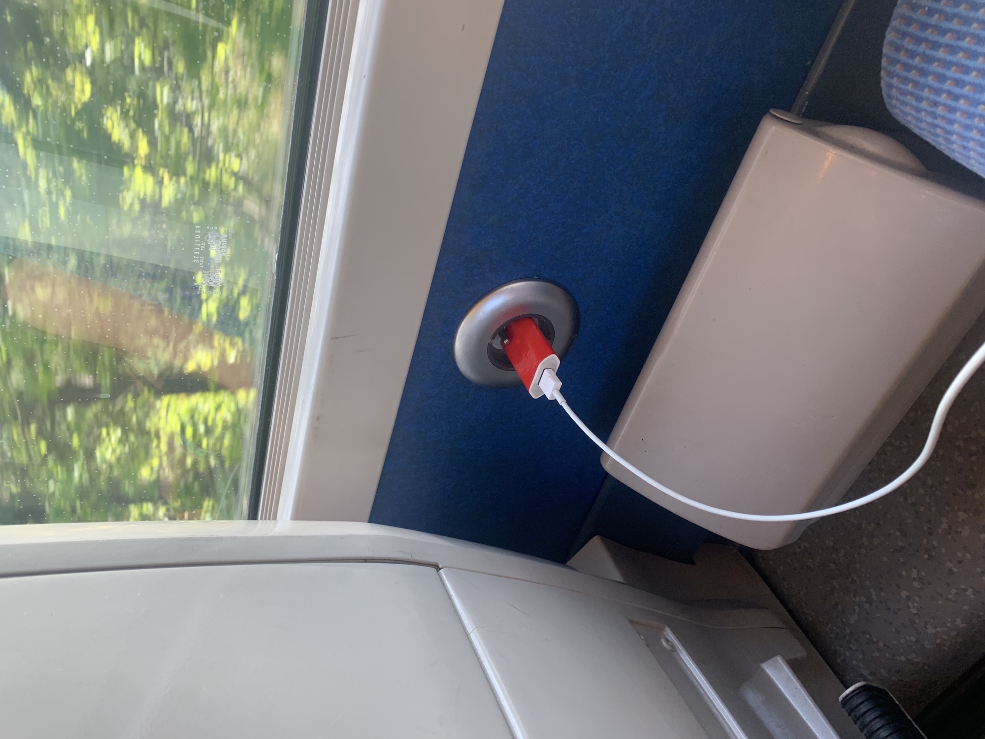 Emma's phone charger on the train
