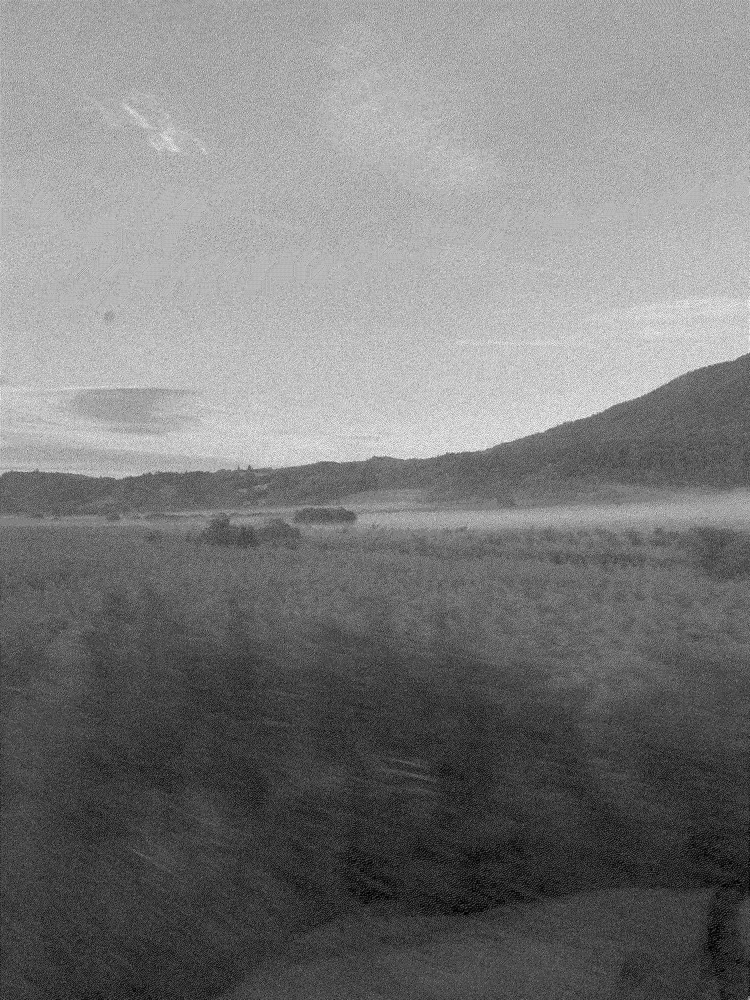 a view of mist and mountains out the window of a sleeper train in France